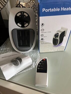 Portable Electric plug in wall heater with remote
